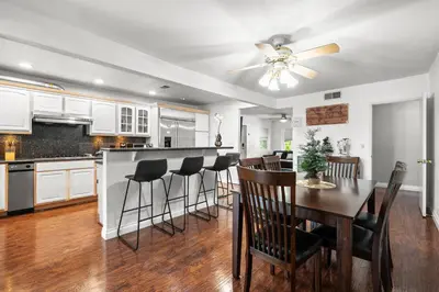 a kitchen and dining room with a table and chairs at Spacious Family Retreat in San Dimas Great Location in Covina