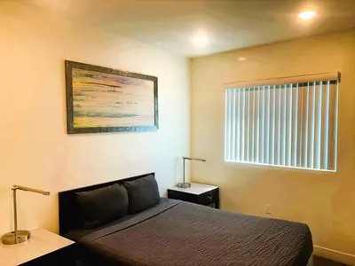 a bedroom with a bed and a window at 3 bedroom Home Casa Serenity Central Los Angeles in Los Angeles