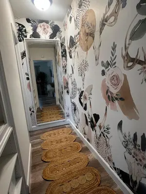 a hallway with a large mirror and a rug at Charming Cozy Studio 5 Minutes from Sofi Stadium in Los Angeles