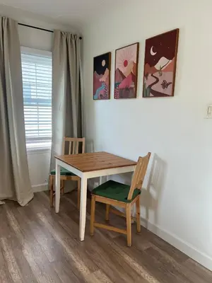 a dining room with a table and two chairs at Charming Cozy Studio 5 Minutes from Sofi Stadium in Los Angeles