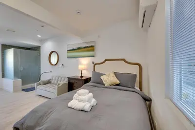 a bedroom with a bed with a teddy bear on it at 4 Mi to Old Pasadena Walkable Studio in Alhambra