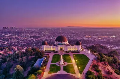 an aerial view of a building with a city in the background at Stylish Studio in Mid-Wilshire with Pool, Free Parking, Gym in Prime Location in Los Angeles