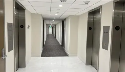 a hallway of an office building with a long corridor at Santa Monica Ocenfront 2 Bedroom Villa with Parking in Los Angeles