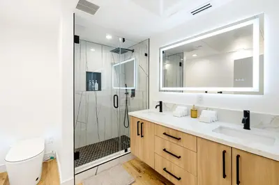 a bathroom with a sink and a shower at Metro Loft LA in Los Angeles
