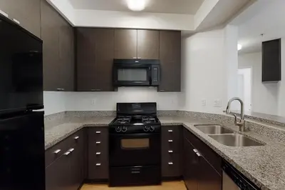 a kitchen with a stove and a microwave at Modern 1BR Retreat in Marina del Rey - Pool, Hot Tub & Gym, Sauna in Los Angeles