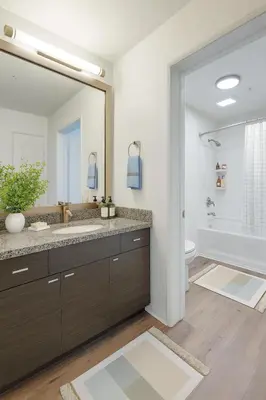 a bathroom with two sinks and a large mirror at Marina Del Rey 2BR & 1BR Getaway - Gym - Pool - Sauna - Near Marina - Venice Beach in Los Angeles