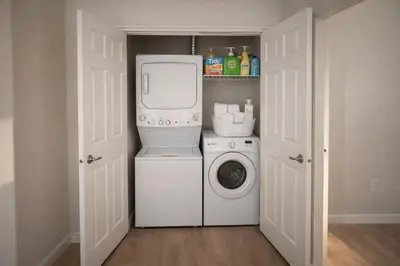 a laundry room with a washer and dryer at Marina Del Rey 2BR & 1BR Getaway - Gym - Pool - Sauna - Near Marina - Venice Beach in Los Angeles