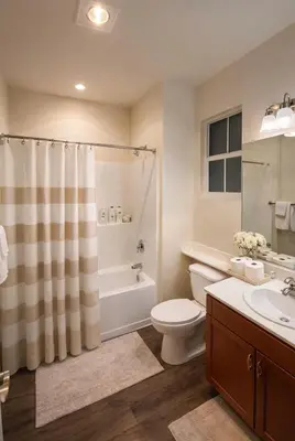 a bathroom with a toilet and a shower and a sink at Marina Del Rey 2BR & 1BR Getaway - Gym - Pool - Sauna - Near Marina - Venice Beach in Los Angeles