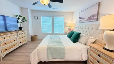 a bedroom with a bed and a flat screen tv at Modern Luxury House 3B&4B House 30 mins DTLA in Baldwin Park