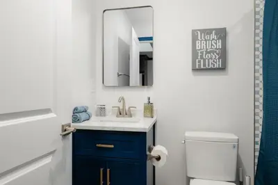 a bathroom with a sink and a mirror at Pet-Friendly 2BR-2BA Near SoFi-Small Dogs Welcome in Los Angeles