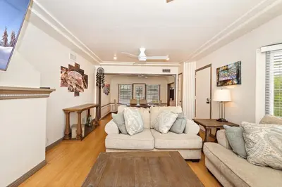 a living room with two couches and a fireplace at The SOFI Special - Modern Retreat, Dog Friendly in Los Angeles