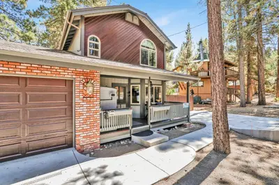a house with a garage and a driveway at Golden West Cottage #2581 in Big Bear Lake