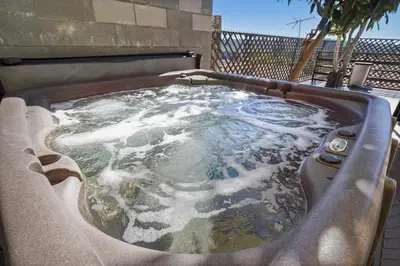 a jacuzzi tub with snow on top of it at Darling 2 bedroom 1 bathroom Highland Park Home with Jacuzzi and View in Los Angeles