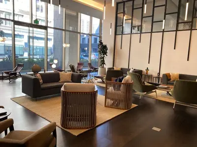 a lobby with couches and chairs in a building at DTLA Luxury Studio in Los Angeles