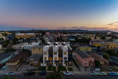 an aerial view of a city at sunset at Luxury Modern 4 Bed 4 Bath Home with Rooftop Deck #6 in Los Angeles