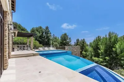 a swimming pool in the backyard of a house at Summitridge Bev Hills Villa with Pool, Spa, Roof Deck in Beverly Hills