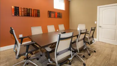 a conference room with a wooden table and chairs at Holiday in LA- Koreatown Retreat with Free Parking, Pool and Sauna in Los Angeles