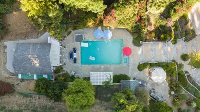 an overhead view of a pool in a yard at Luxury LA Garden Estate Private Pool HotTub Tennis in La Habra