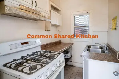 a kitchen with a stove and a sink at Cozy Studio Near Downtown LA with AC WiFi and Snacks in Los Angeles