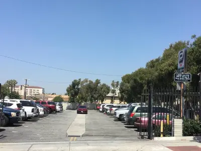a parking lot with a lot of parked cars at Charming Studio Near DTLA AC WiFi Snacks in Los Angeles