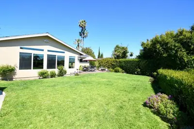 a house with a large lawn in front of it at Rancho Palos Verdes View Home in Rancho Palos Verdes