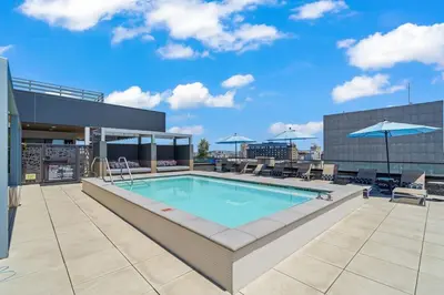 a swimming pool on the roof of a building at Cozy Beachside Escape with Great Views in Long Beach