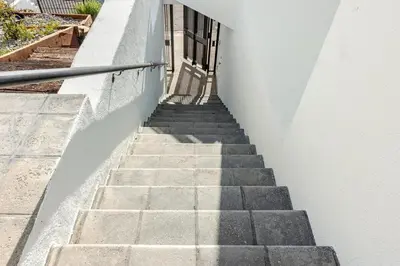 a set of stairs leading up to a building at Gorgeous Malibu Retreat with #Instaworthy Ocean Views in Malibu Beach
