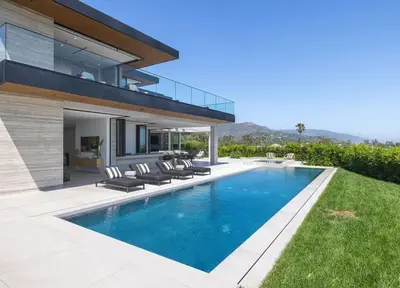 a house with a swimming pool in the yard at Luxurious Malibu 6BR Estate with Pool, Theatre, Views in Malibu Beach