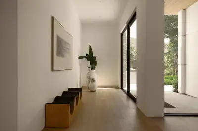 a living room with a couch and a vase at Malibu Coastal Paradise with Pool, Spa and Tennis Court in Malibu
