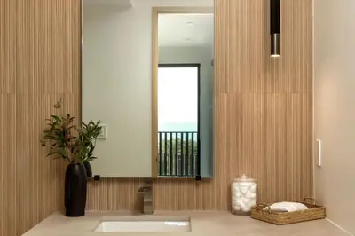 a bathroom with a sink and a mirror at Malibu Coastal Paradise with Pool, Spa and Tennis Court in Malibu