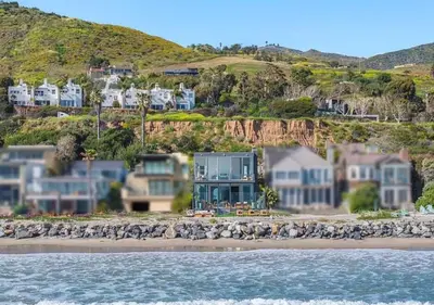 a view of a beach with houses and the water at Luxury Beachfront Villa W. Stunning Pacific Views in Malibu