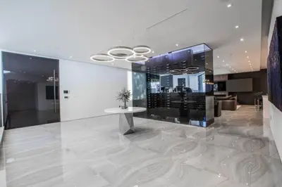 a lobby with a table in a building at Beverly Hills Luxurious 4BR Villa with Pool and Views in Los Angeles