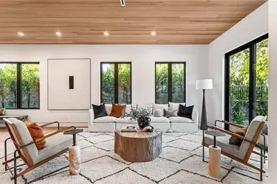 a living room with a couch and a coffee table at Stunning 5BR in Studio City W. Pool, and Jacuzzi in Los Angeles