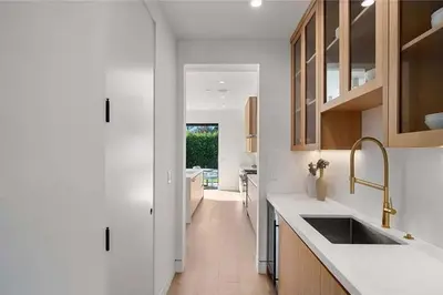 a kitchen with white counters and a sink at Stunning 5BR in Studio City W. Pool, and Jacuzzi in Los Angeles