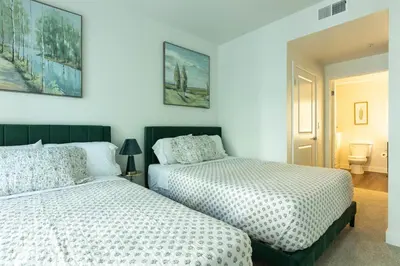 two beds sitting next to each other in a bedroom at Cozy and Calm Retreat in Heart of Glendale in Glendale
