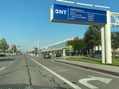 a street sign on the side of a road at Luxury 4 Bedroom Home Pool Big Yard San Bernardino in San Bernardino