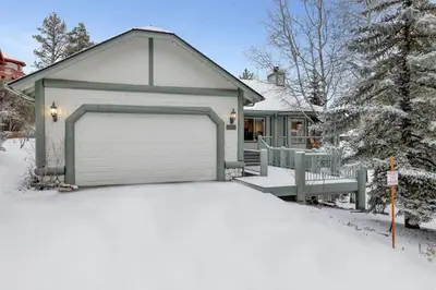 a garage in front of a house in the snow at Modern Relaxation at Castle Glen Gem Big Bear Lake in Big Bear Lake