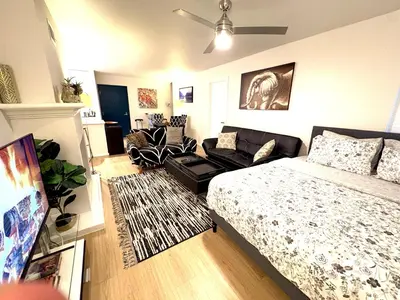 a bedroom with a bed and a living room at Great 2 Bedroom and 2 Bathroom Apartment in Marina in Los Angeles