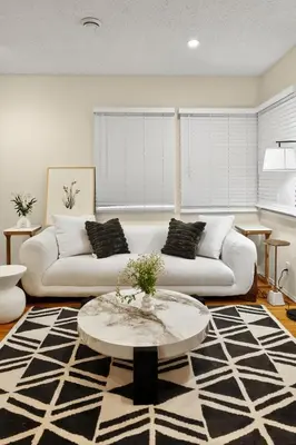 a living room with two couches and a table at Stylish LAX Area 2BR 1BA by LMU, SoFi Stadium & Coastal Beaches in Los Angeles