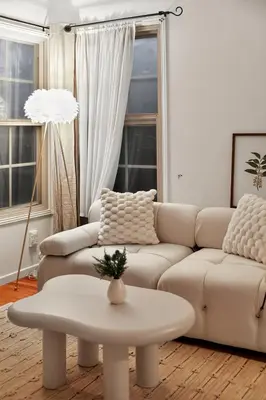 a living room with a couch and a table at Cozy Comfort Stylish 2BR 1BA near LAX, LMU, SoFi Stadium & Beaches in Los Angeles