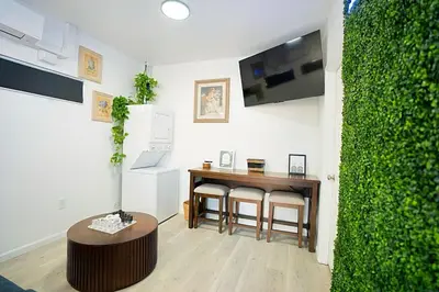 a living room with a small table and chairs at Modern Guesthouse ADU Sanctuary in San Bernardino
