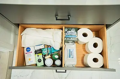 a drawer with toiletries and toilet paper in a bathroom at Modern Guesthouse ADU Sanctuary in San Bernardino