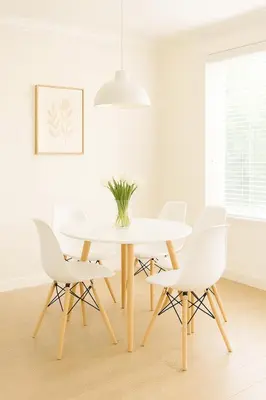 a white dining room with a white table and chairs at Modern 1Bed in Koreatown- Pool, Sauna & Free Parking in Los Angeles