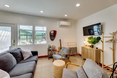 a living room with a couch and two chairs at 3 Mi to Old Pasadena Cozy Couples Studio with Pool in Pasadena