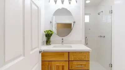 a bathroom with a sink and a mirror at Sunny Venice Beach Home with Open Living Walkability to Abbot Kinney Venice Drift by AvantStay in Los Angeles