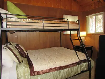 a bunk bed in a small room with a bunk bedutenewayangering at M & M Sweet Retreat in Big Bear Lake