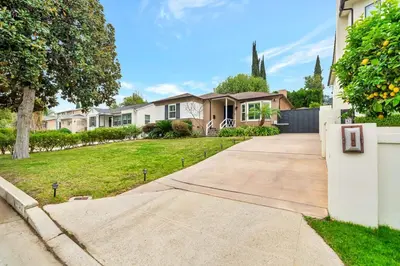 a driveway leading to a house at Charming 3BR with Ping-Pong and Spa!