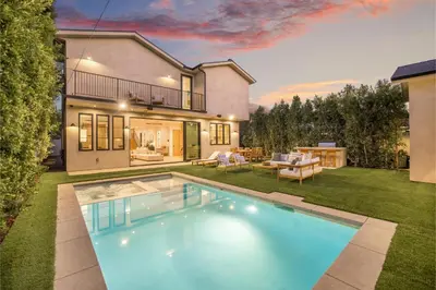 a house with a swimming pool in a yard at Kraft Villa in Los Angeles