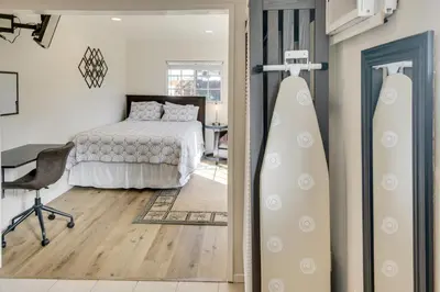 a bedroom with a bed and a desk and a desk at Work and Play! Extended-Stay Studio in Simi Valley in Simi Valley