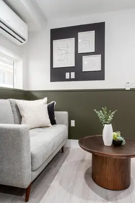 a living room with a couch and a table at Cozy LA Getaway Fast Wi-Fi and Smart TV in Los Angeles